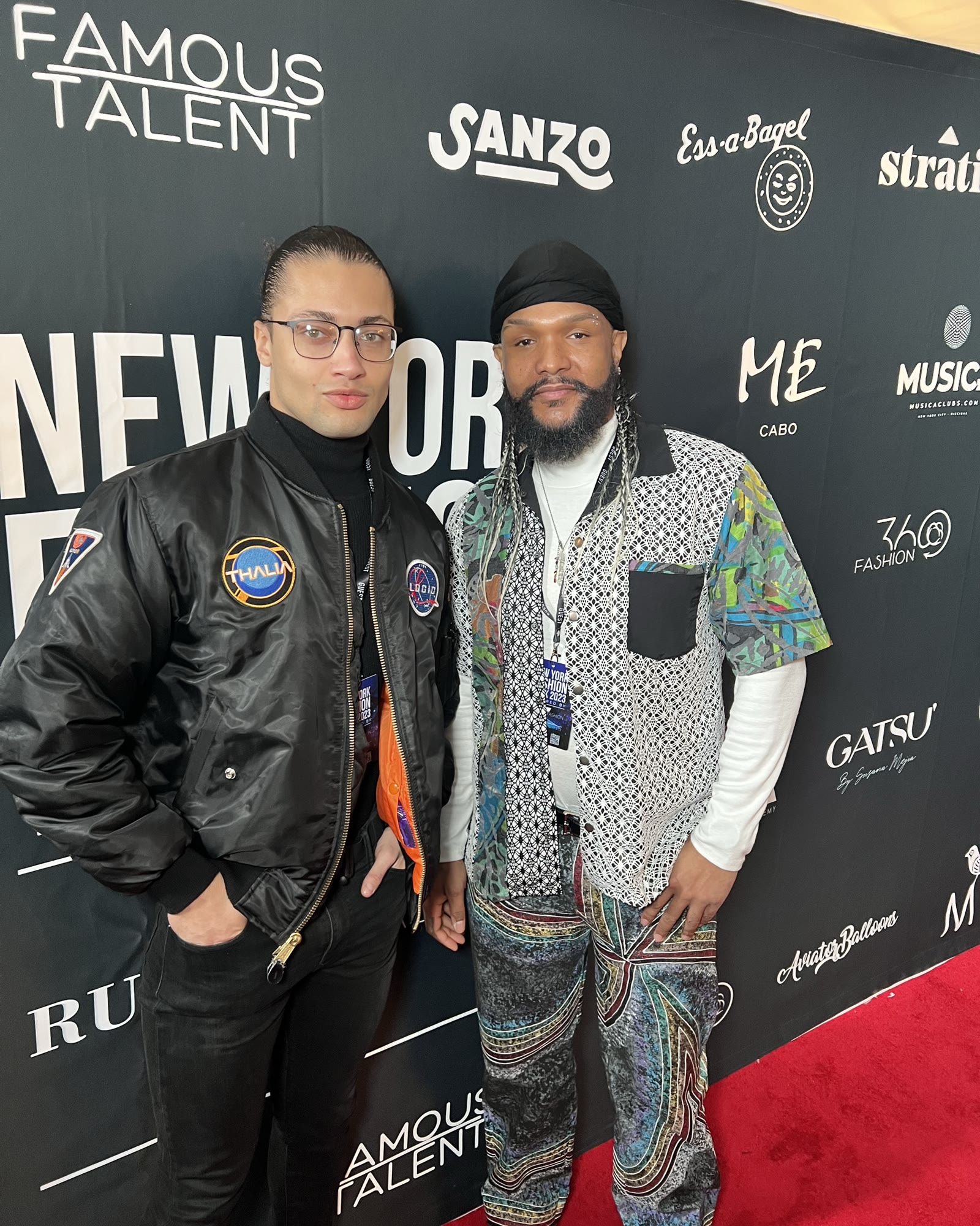 Two people on the New York Fashion Week red carpet